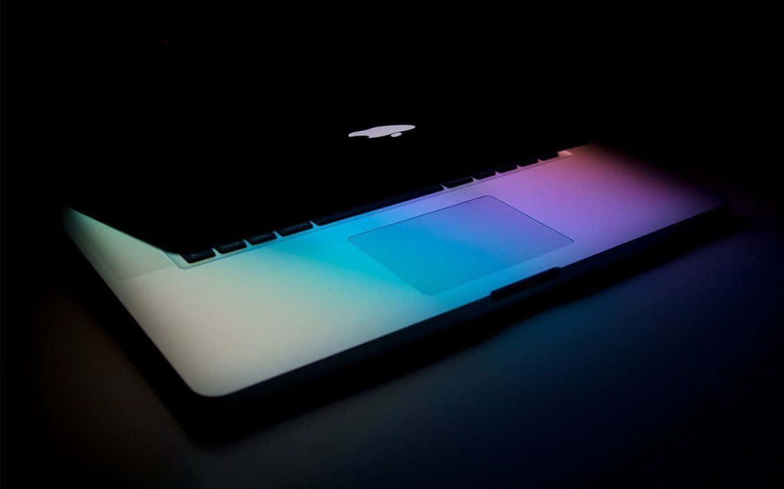 Gradient-Colored Laptop Apple Wallpaper