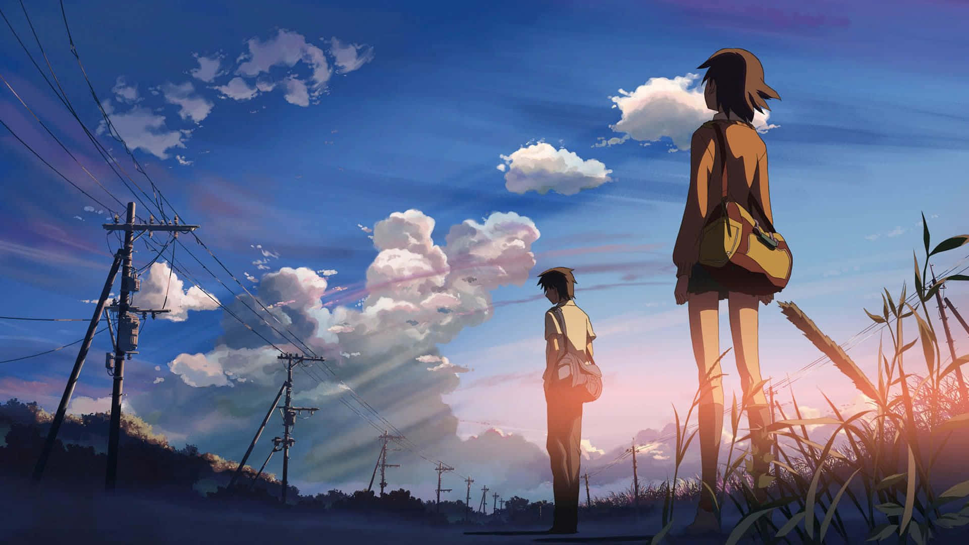Two People Standing On A Field With Clouds In The Background Wallpaper
