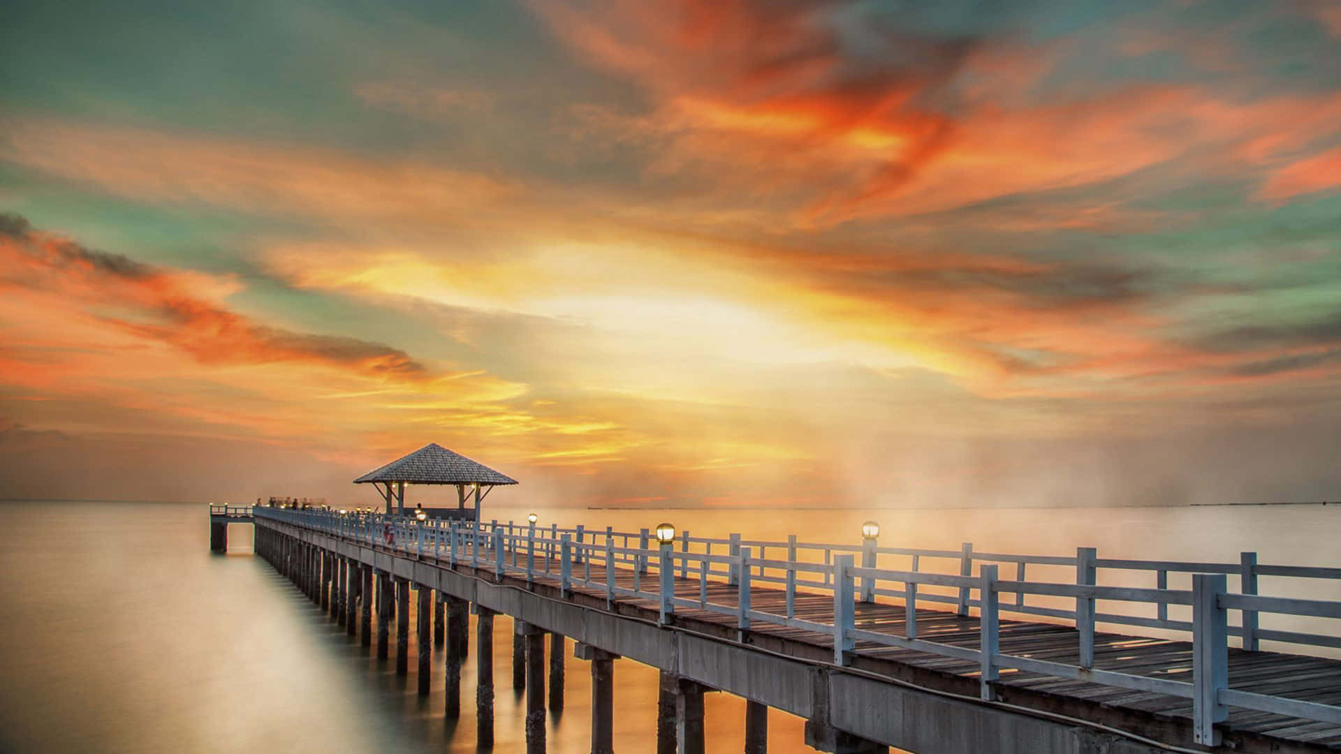 A Pier With A Gazebo In The Water Wallpaper