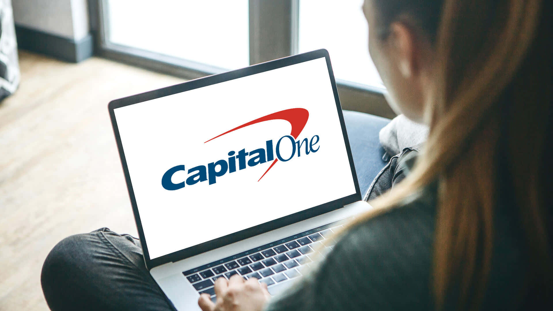 Laptop Screen With Capital One Logo Wallpaper