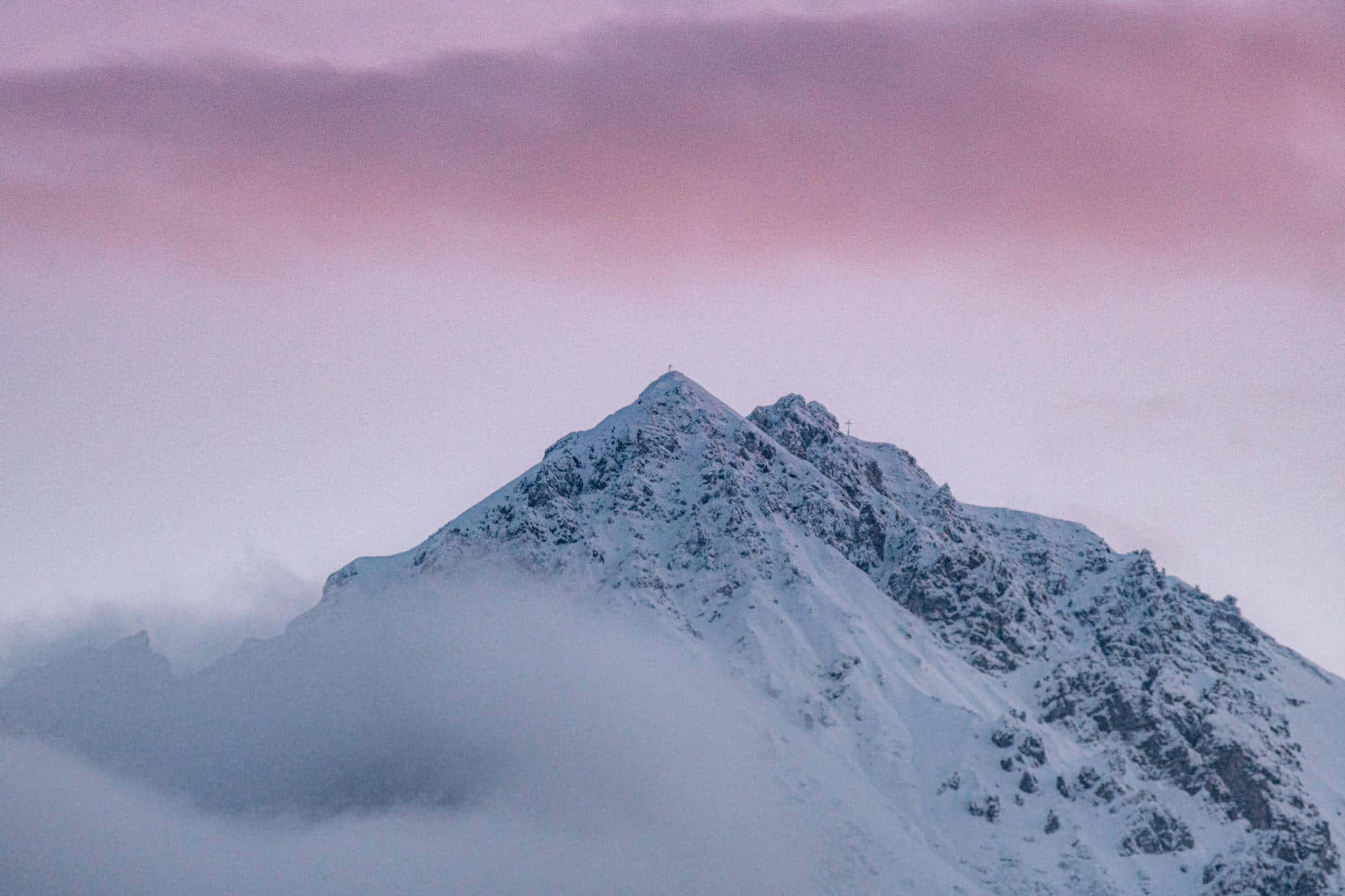 A Mountain With A Cloudy Sky Wallpaper