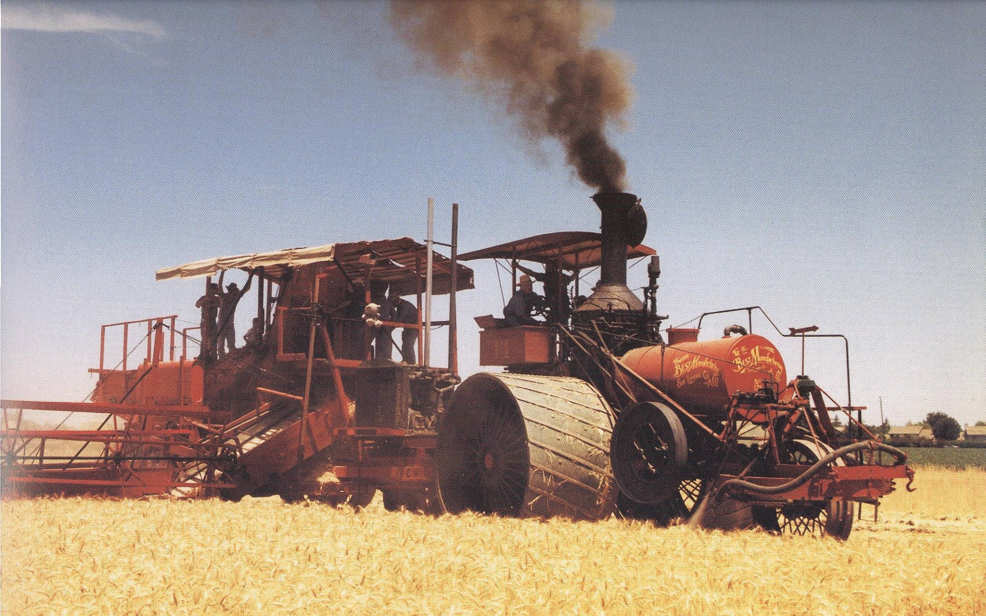 Large Old-School Tractor On Field Wallpaper