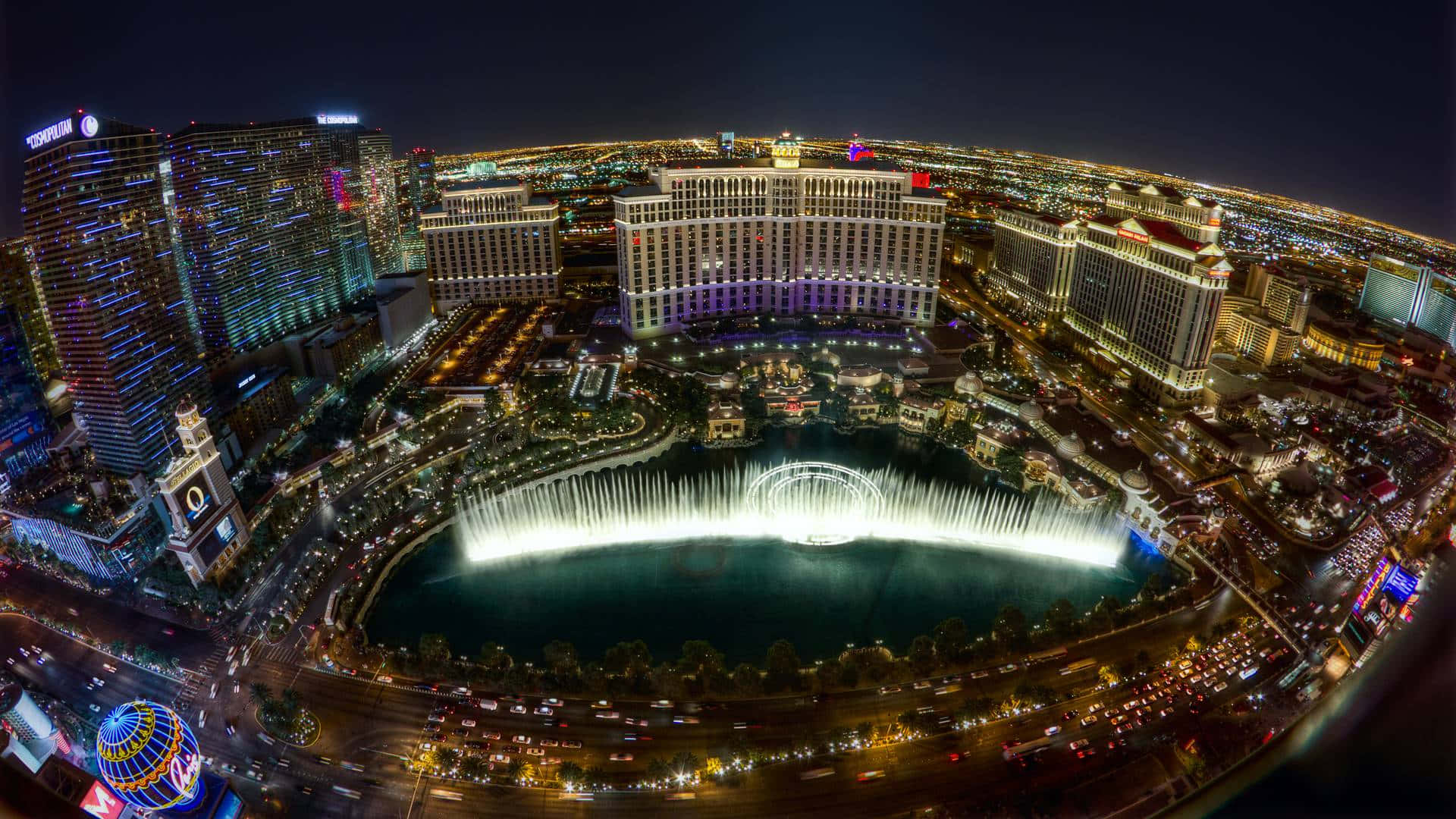 Vivil'esperienza Del Vibrante Skyline Della Città Di Las Vegas Sfondo