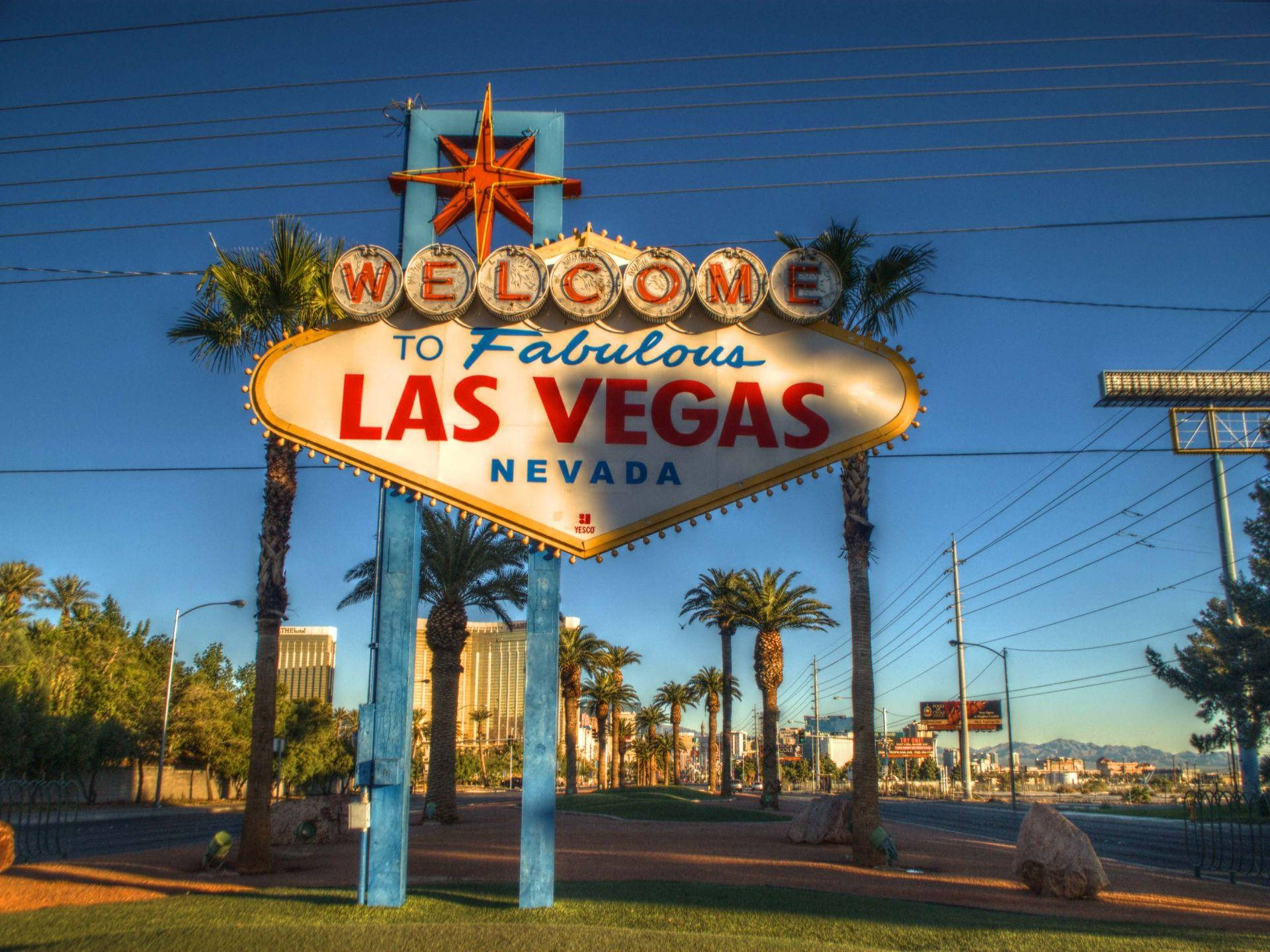Letrerodel Strip De Las Vegas Por La Tarde. Fondo de pantalla