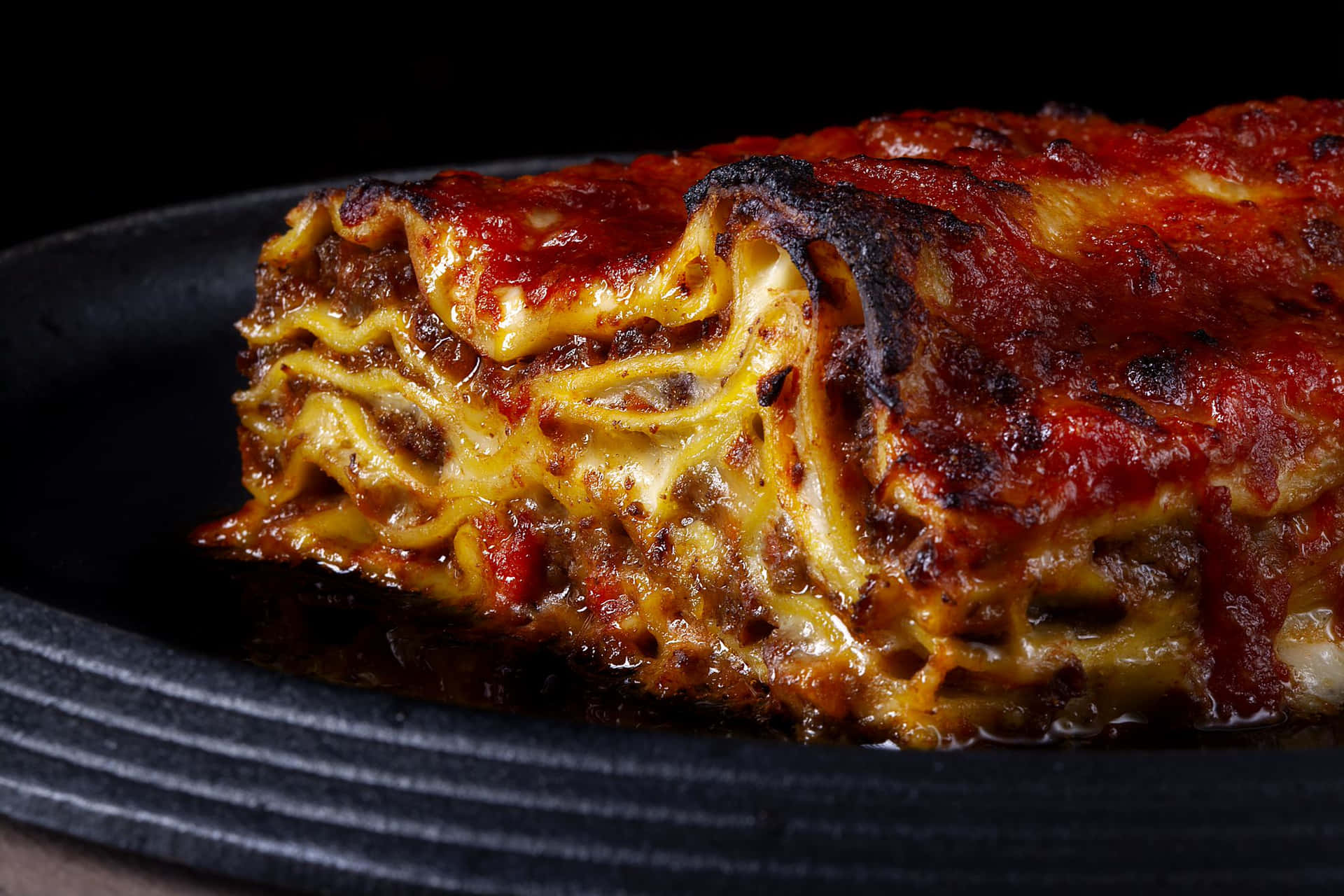 "Delicious Lasagna Alla Bolognese with Gooey Cheese and Perfectly Burnt Edges" Wallpaper