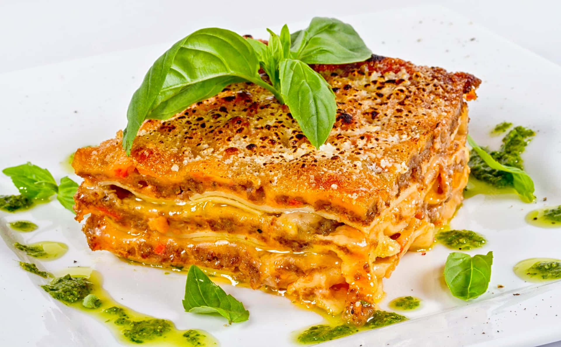 Lasagna Alla Bolognese Garnished With Basil Wallpaper