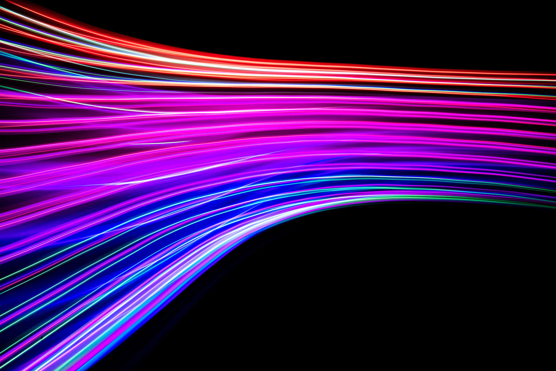 A Colorful Light Wave On A Black Background