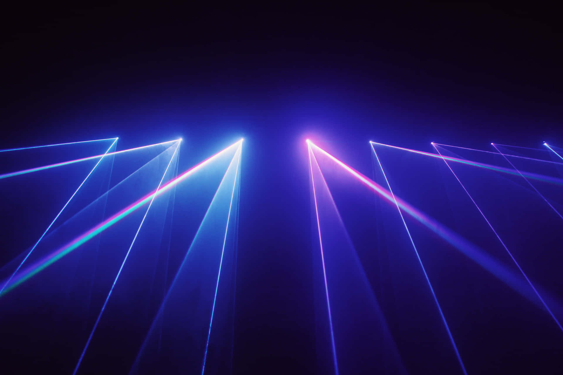 Laser beams blasting into the night sky