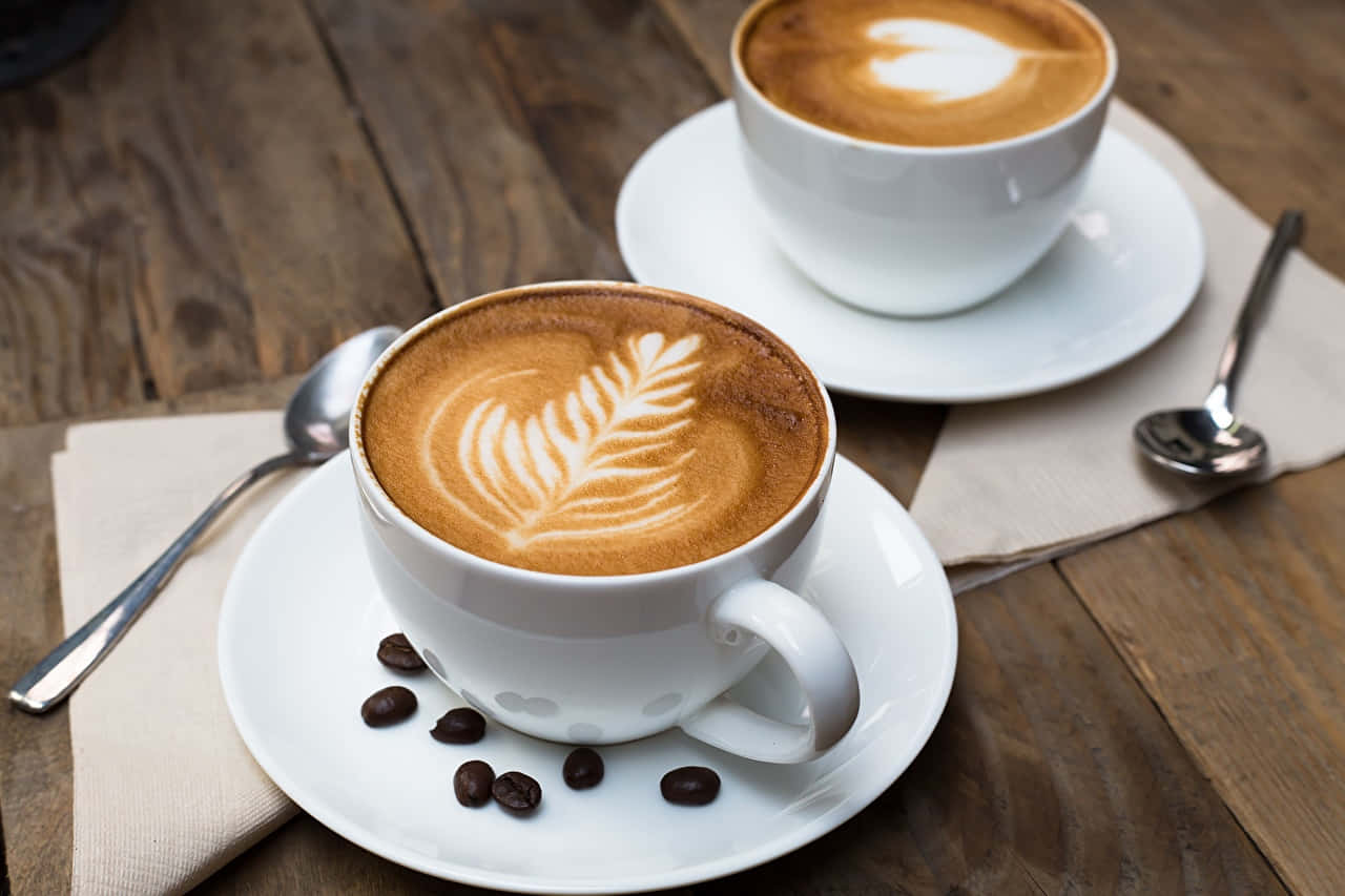 Latte Art Coffee With Spoon Wallpaper