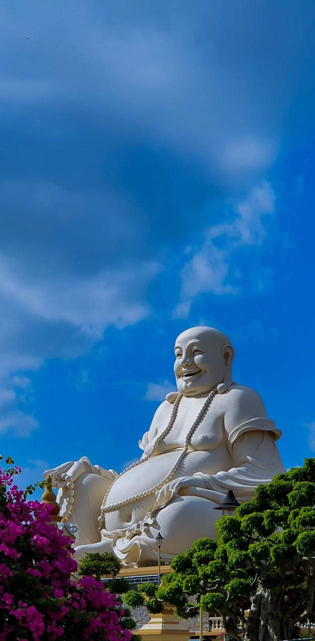 Estatuadel Buda Riendo En El Chùa Phật Lớn (gran Templo Del Buda) Fondo de pantalla