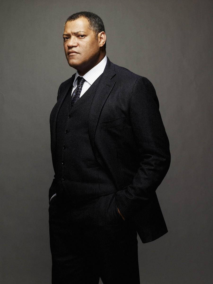 Laurence Fishburne in Casual Attire standing-confidently with his hands in his pockets Wallpaper