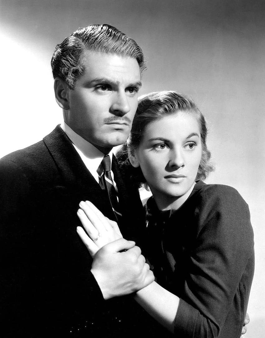 Cinematic Moments: Laurence Olivier and Joan Fontaine in Rebecca 1940 Wallpaper