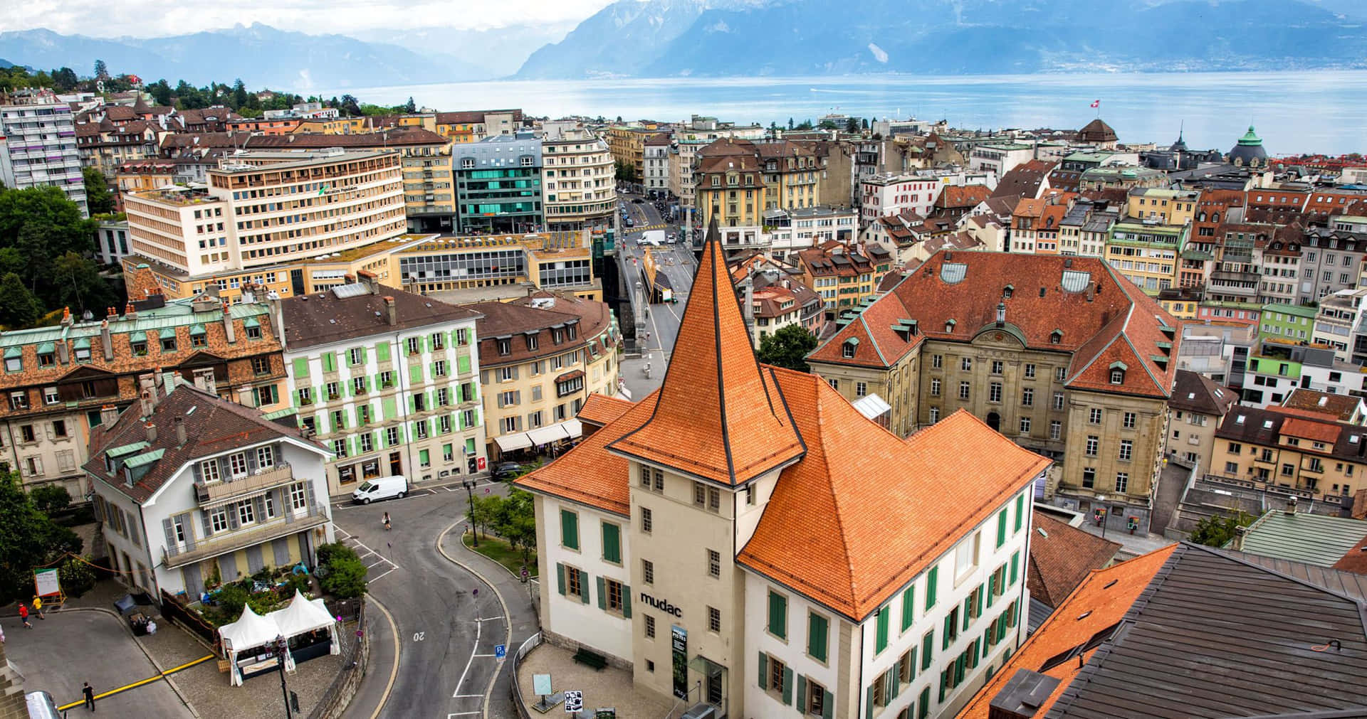 Lausanne Cityscapewith Lake Geneva Wallpaper