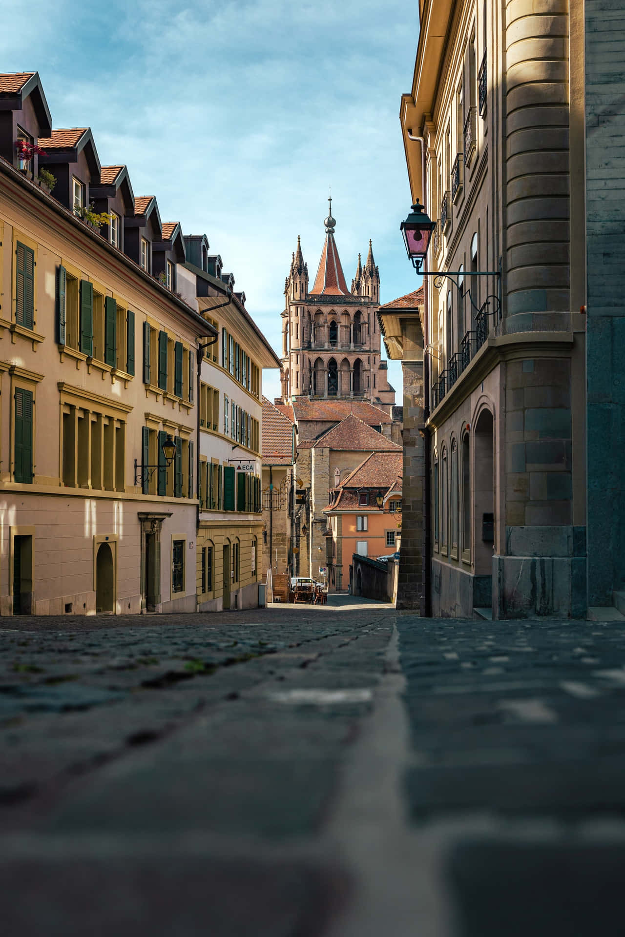 Lausanne Cobbled Streetand Cathedral Wallpaper