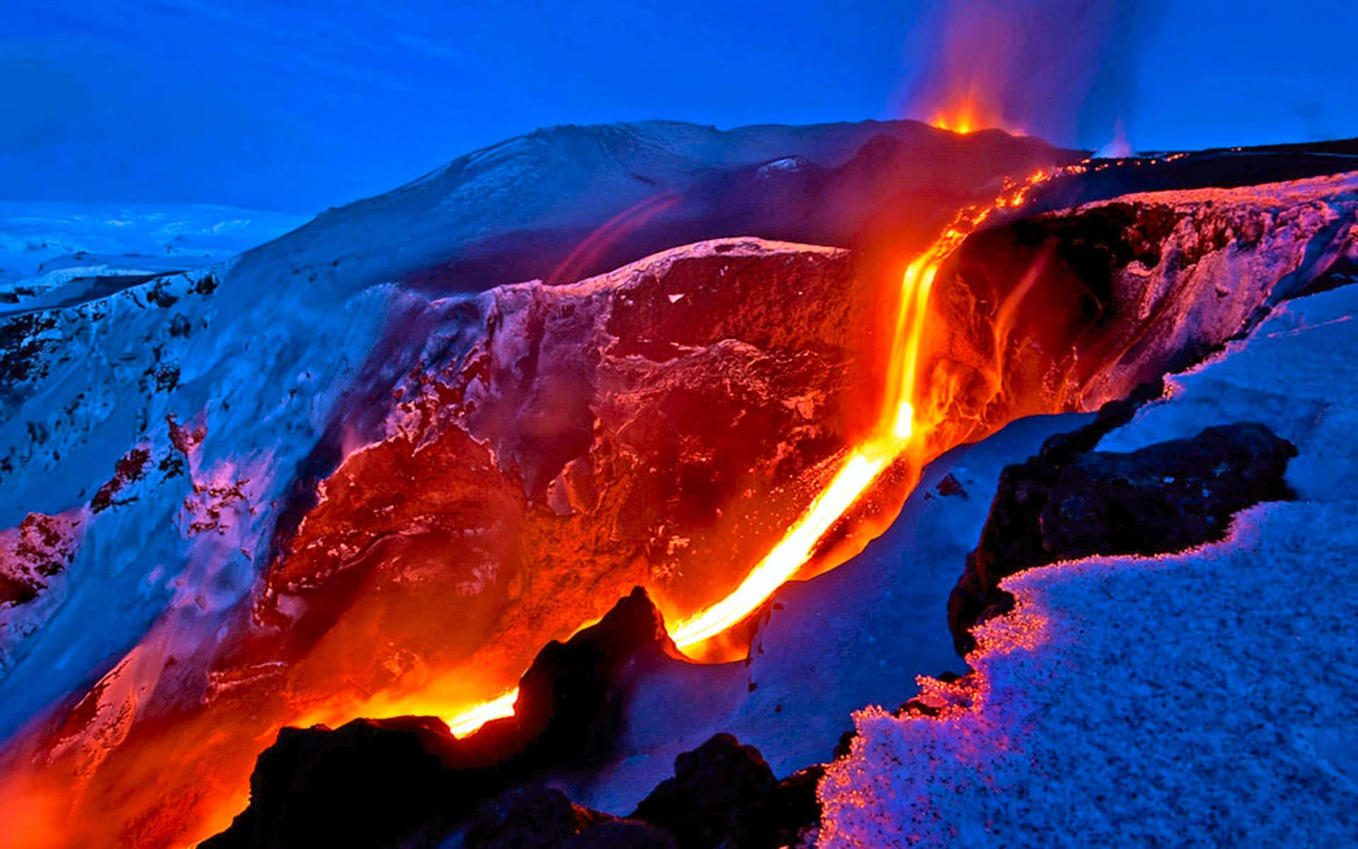 A Lava Flow Coming Out Of A Mountain