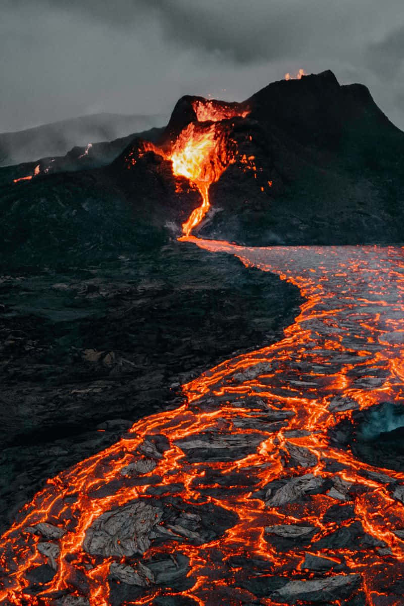 Firey lava flows swirling in the depths of an active volcano