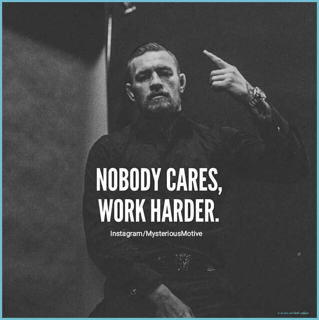A Man With A Ring On His Hand With The Words Nobody Cares Work Harder Wallpaper
