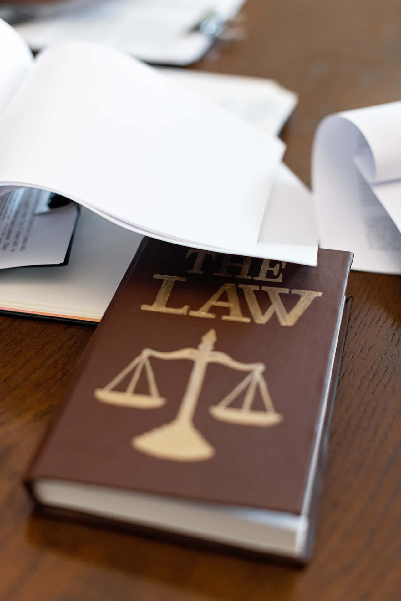 Law Book On Judicious Decisions Wallpaper