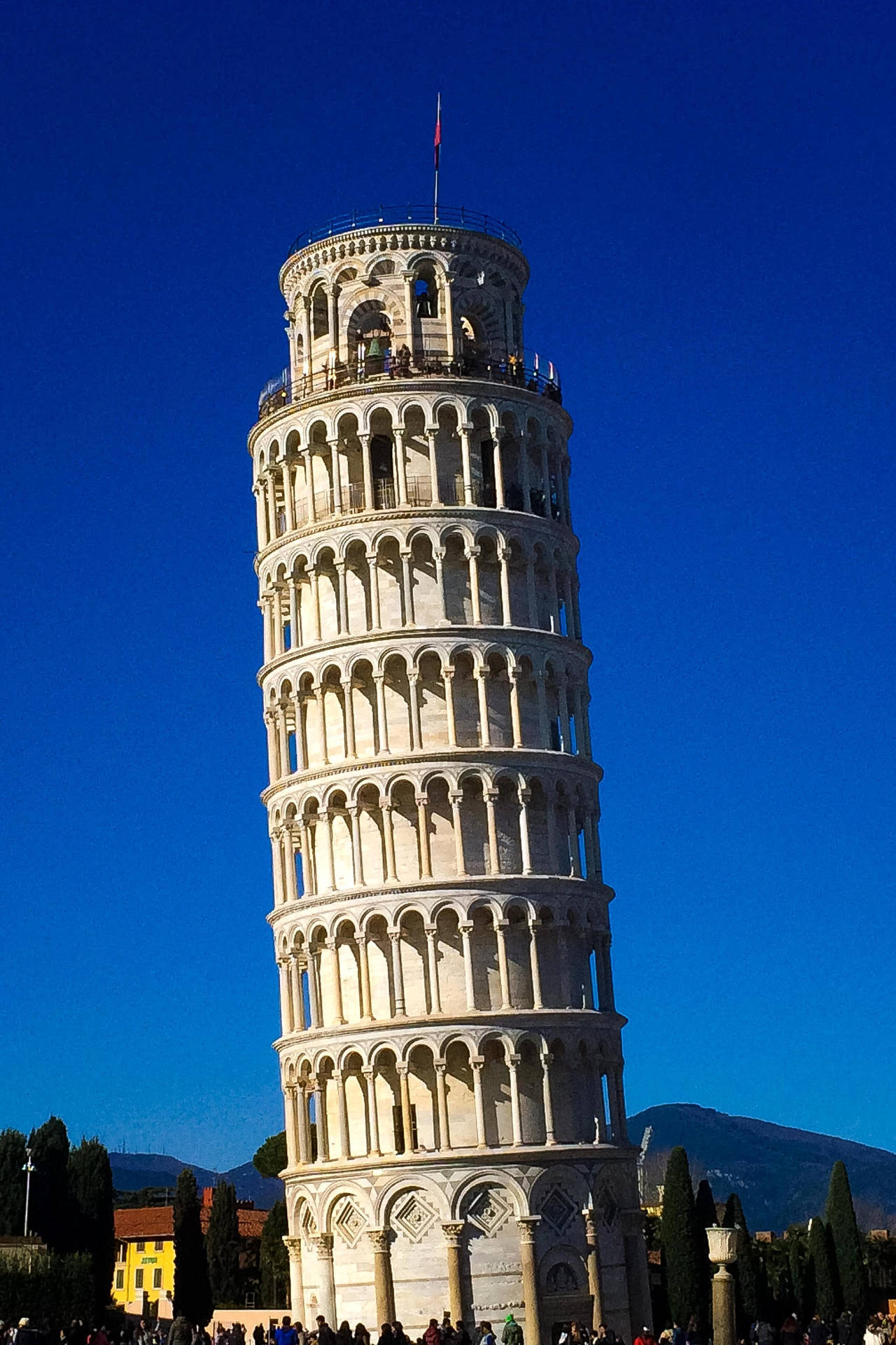 Leaning Tower Of Pisa Against Dark Blue Sky Wallpaper