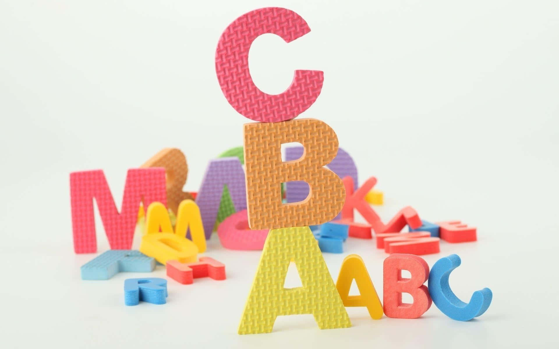 Colorful Alphabet Blocks On A White Background