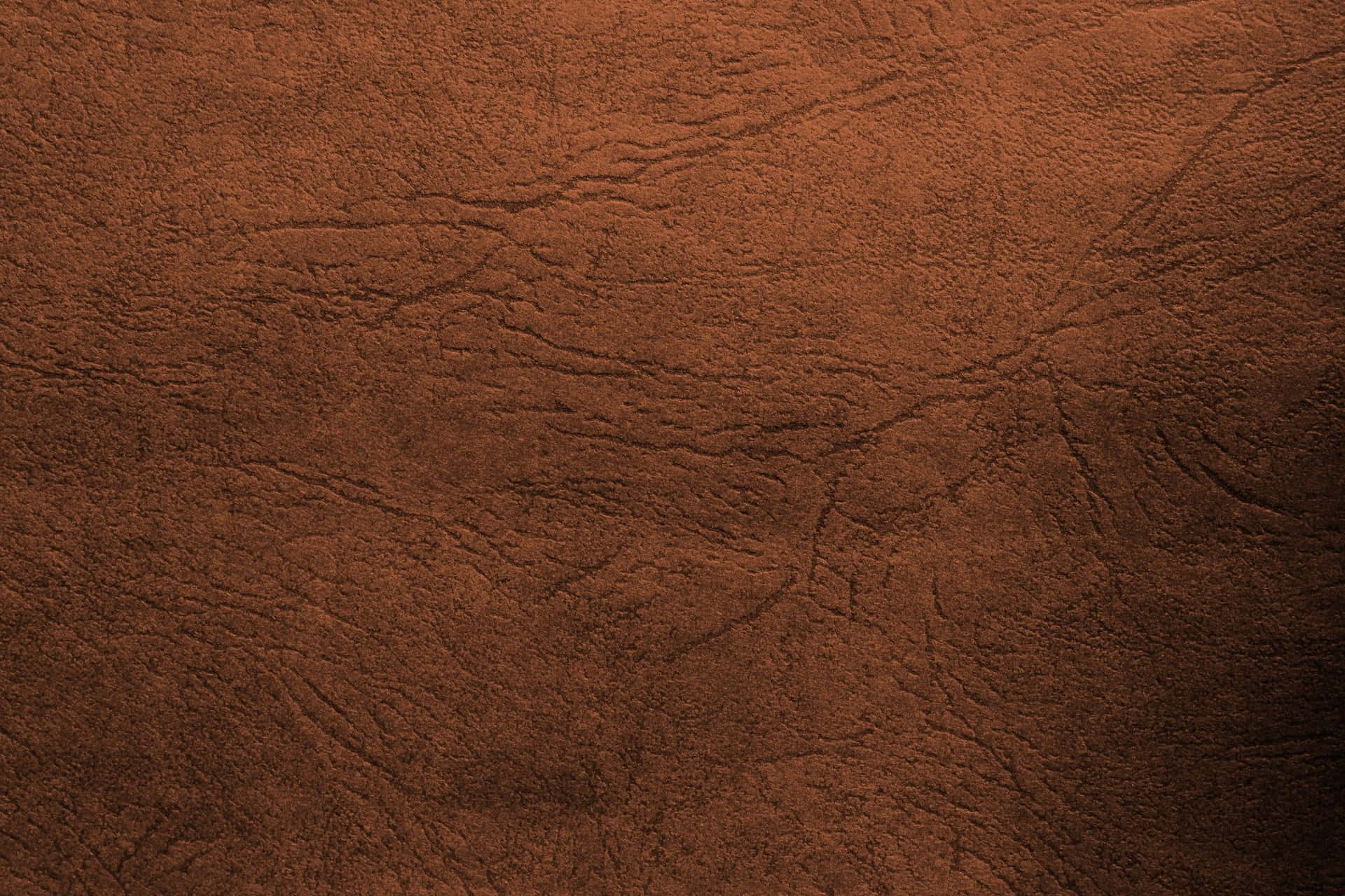 A Close Up Of A Brown Leather Texture