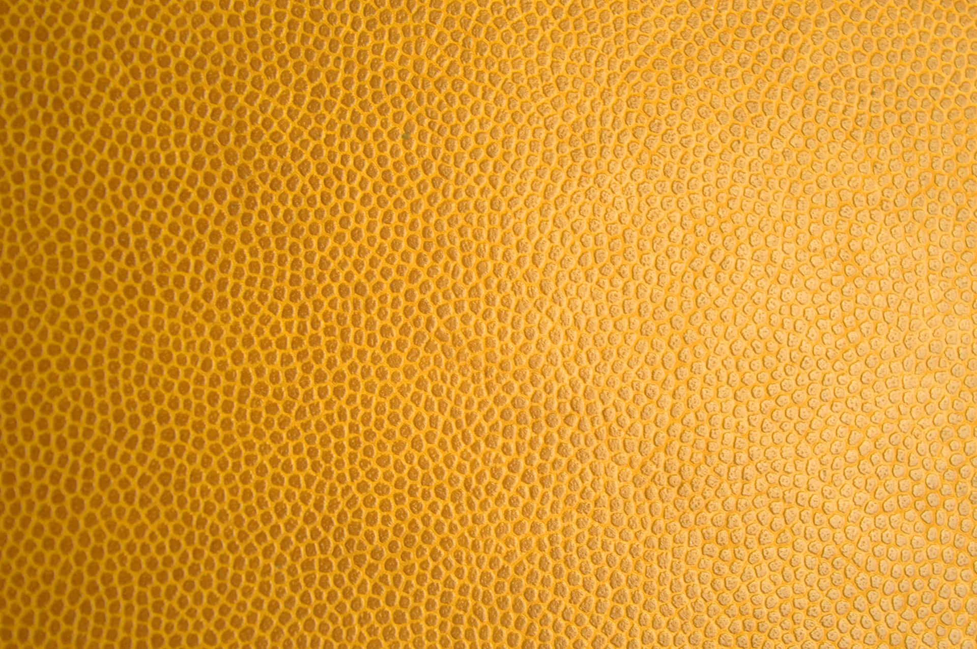 A Close Up Of A Yellow Leather Texture