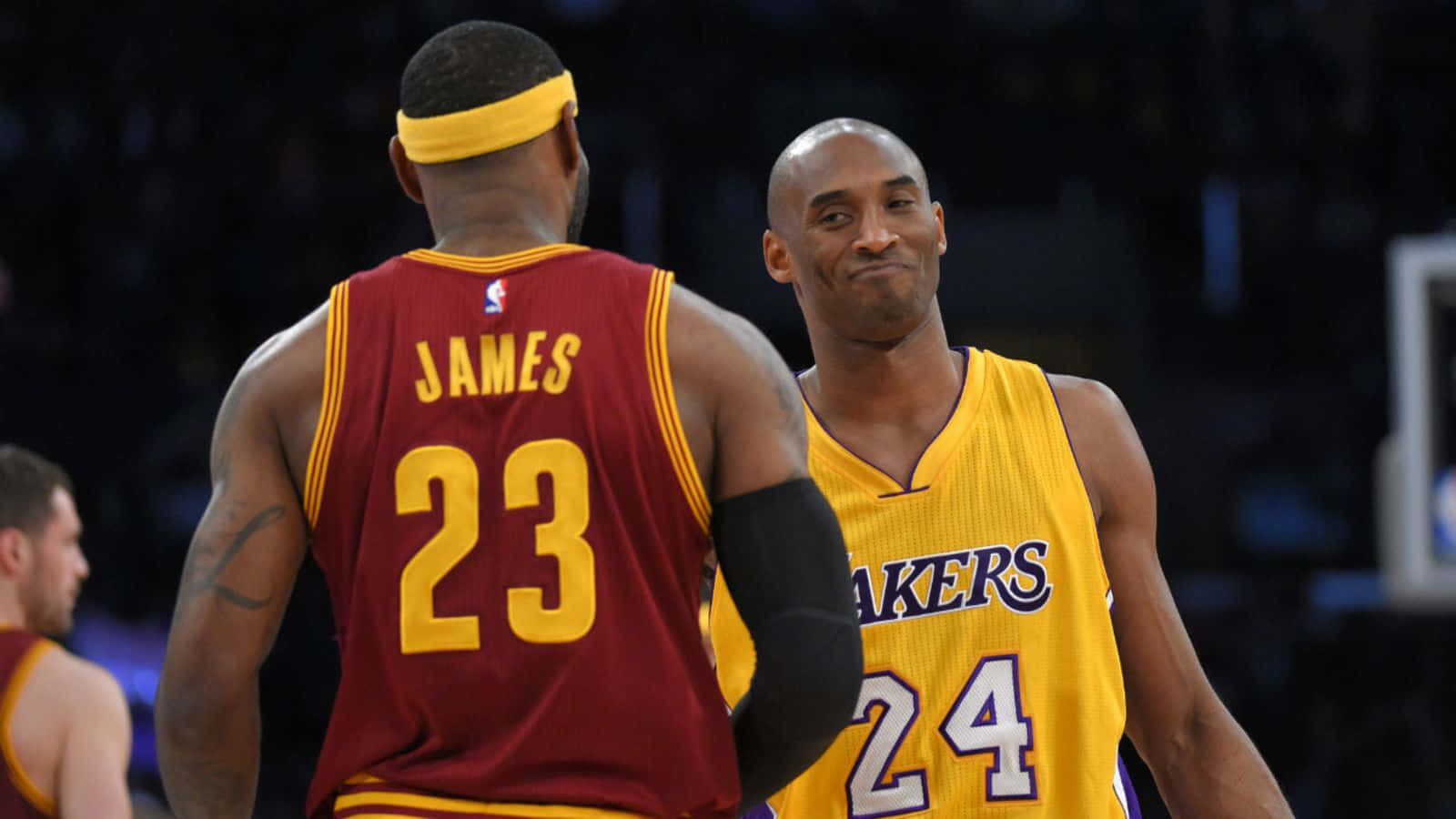 Lebron And Kobe Smirking After A Play Wallpaper