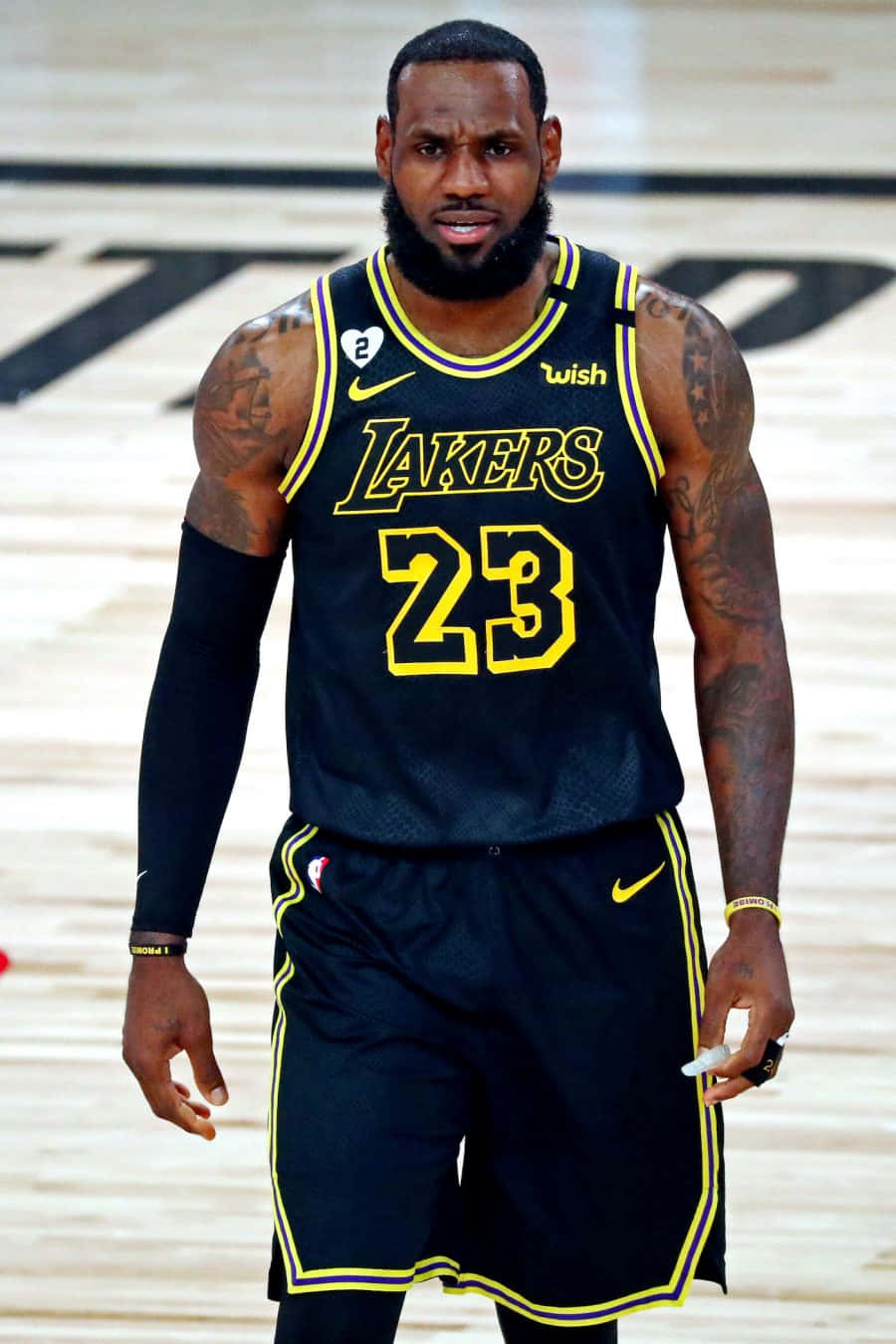 LeBron James celebrates his fourth NBA Championship win with the Los Angeles Lakers