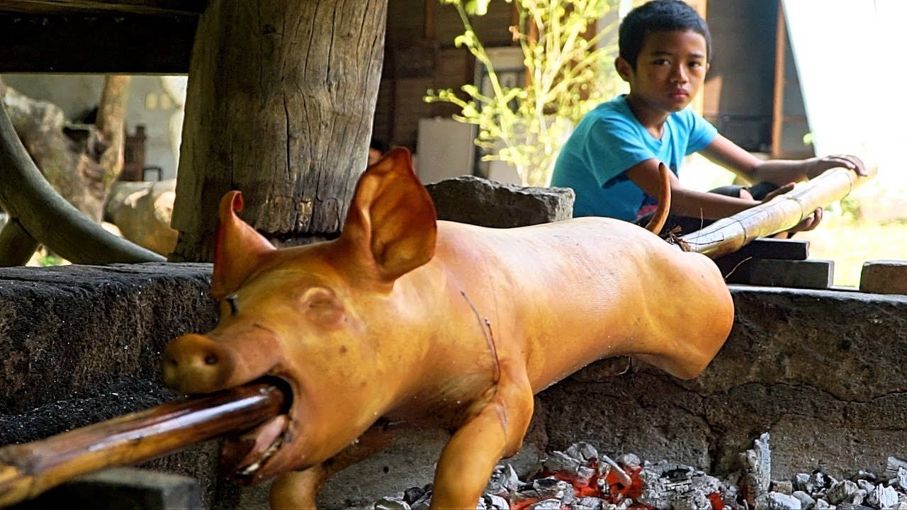 Lechon Being Rolled Wallpaper