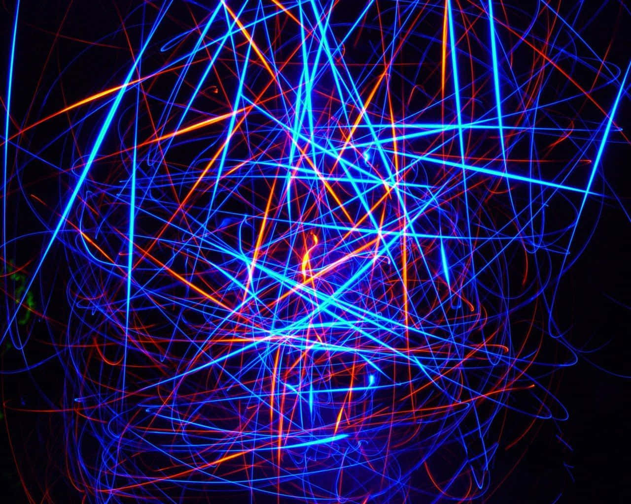 A Light Painting Of Blue And Orange Lines