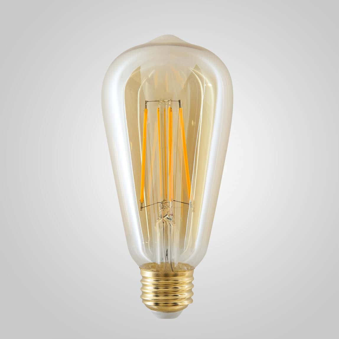 A Light Bulb With A Gold Filament