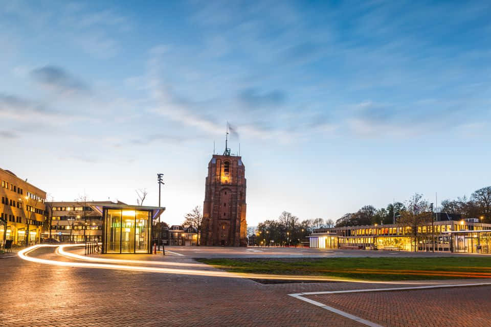 Download Leeuwarden Historic Towerat Twilight Wallpaper | Wallpapers.com