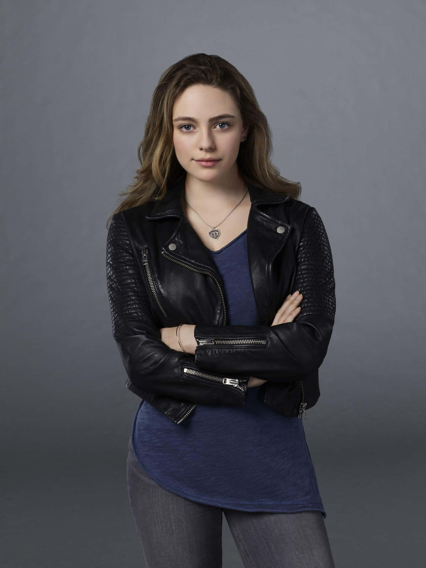 A Young Woman In A Black Leather Jacket Wallpaper