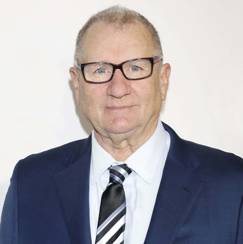 Legendary Actor Ed O'neill In A Thoughtful Pose. Wallpaper