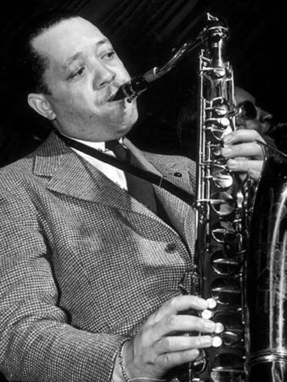 Legendary Musician Lester Young Playing The Saxophone Wallpaper