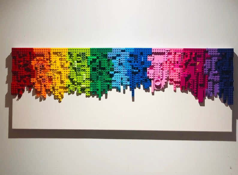 A Colorful Lego Wall Hanging On A Wall