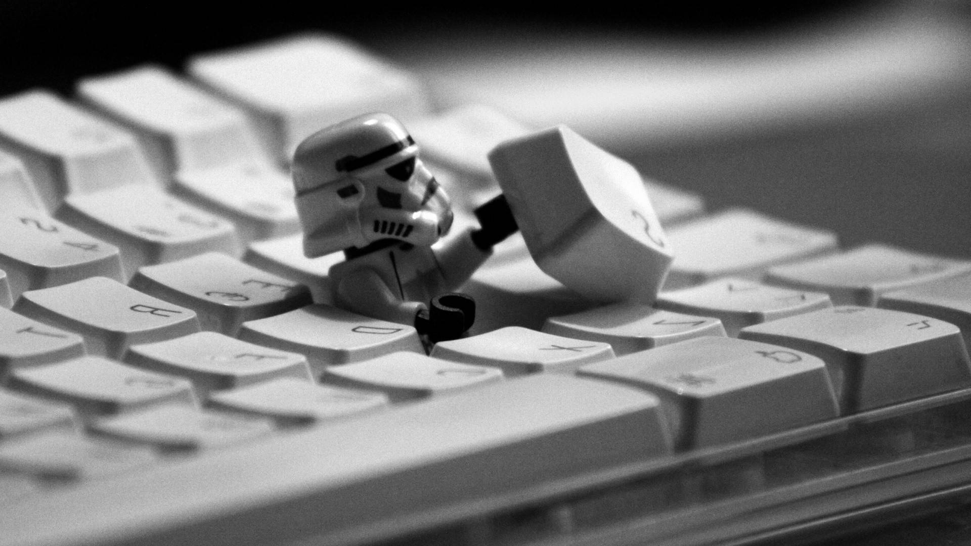 Lego Star Wars Stormtrooper Removing Keycap Wallpaper