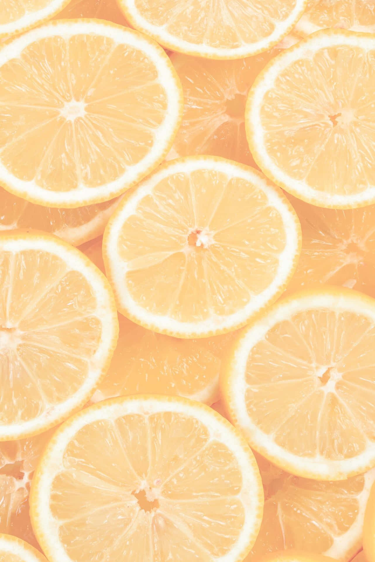 A Close Up Of Sliced Lemons Wallpaper