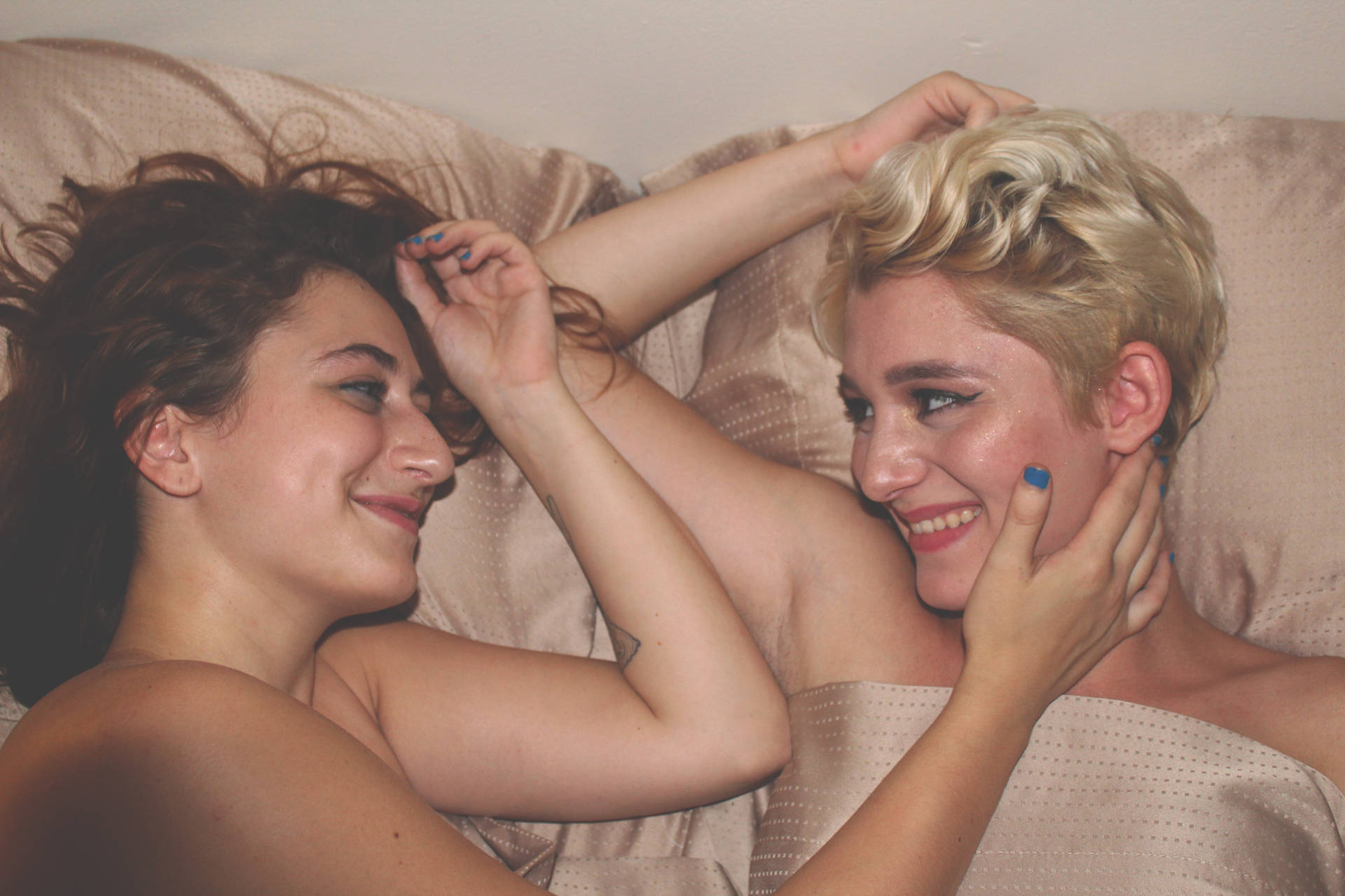 Lesbian Couple On Bed Wallpaper
