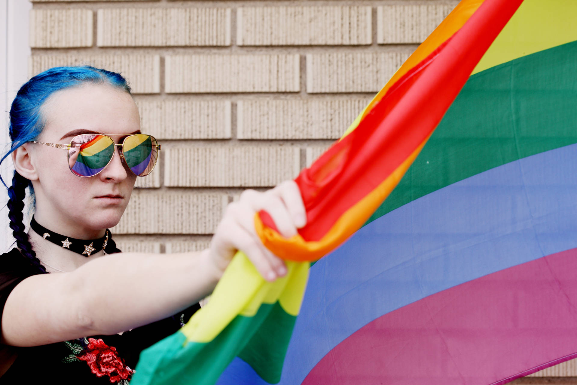 Lesbian Holding Lgbt Flag