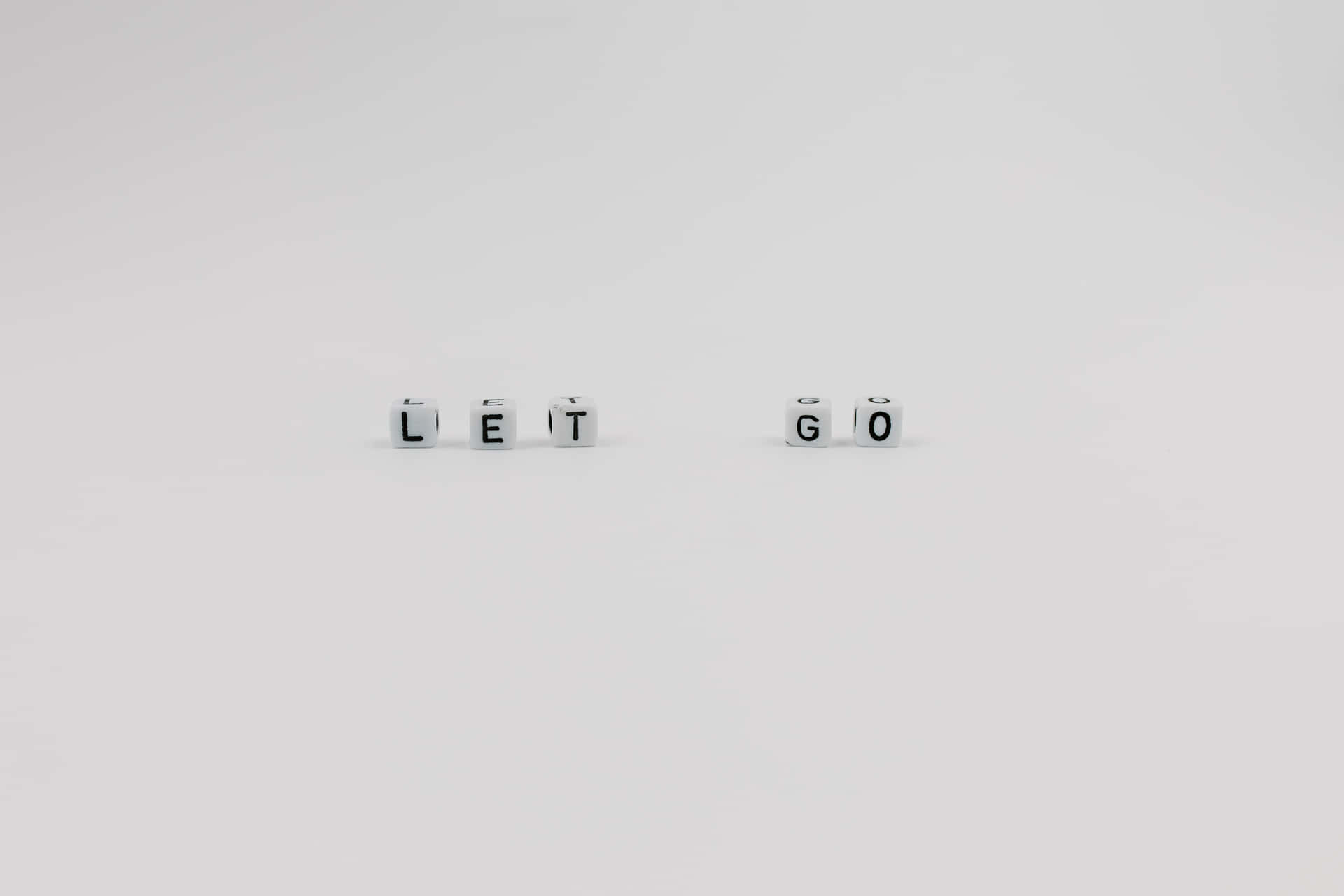 Inspirational Let it Go Blocks Message Wallpaper