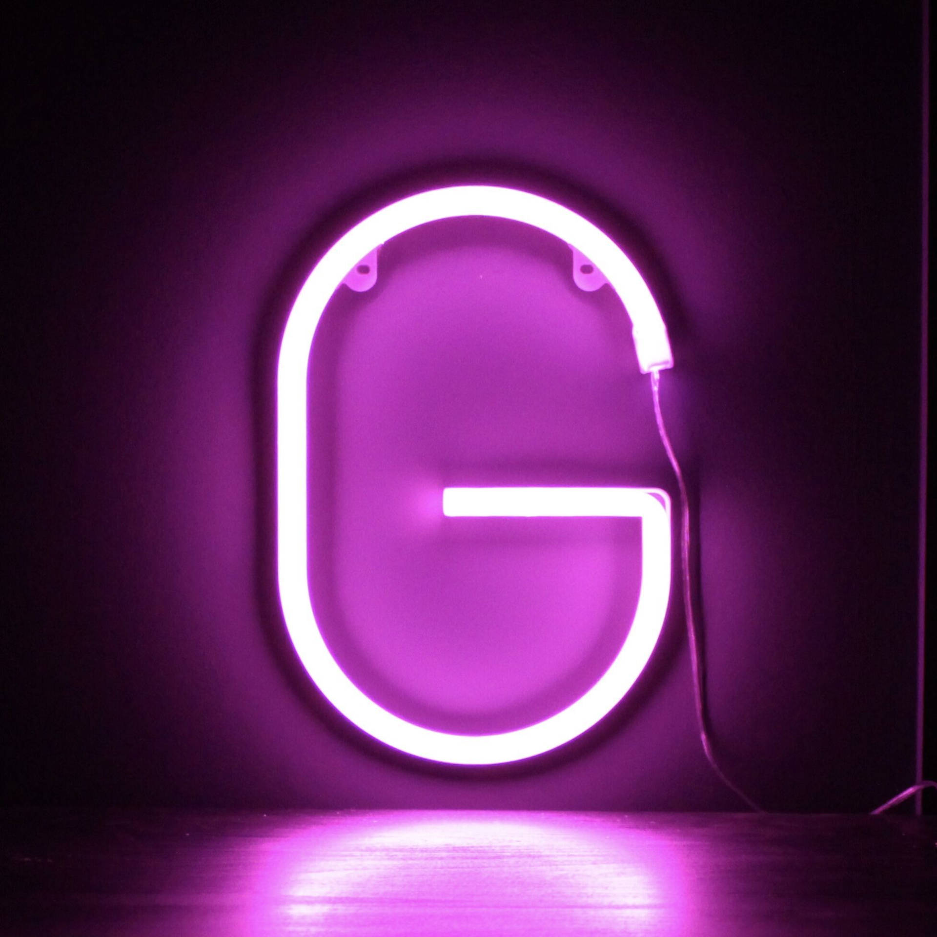 Letter G In Purple Neon Light