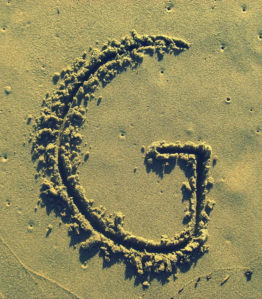 Letter G In The Sand Wallpaper
