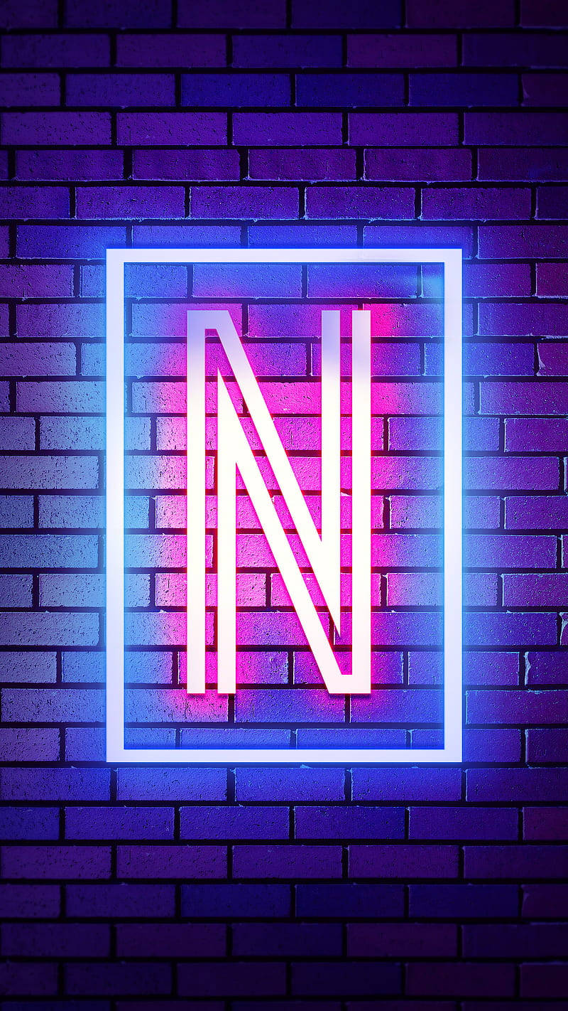 Download Letter N Neon Light Brick Wall Wallpaper | Wallpapers.com