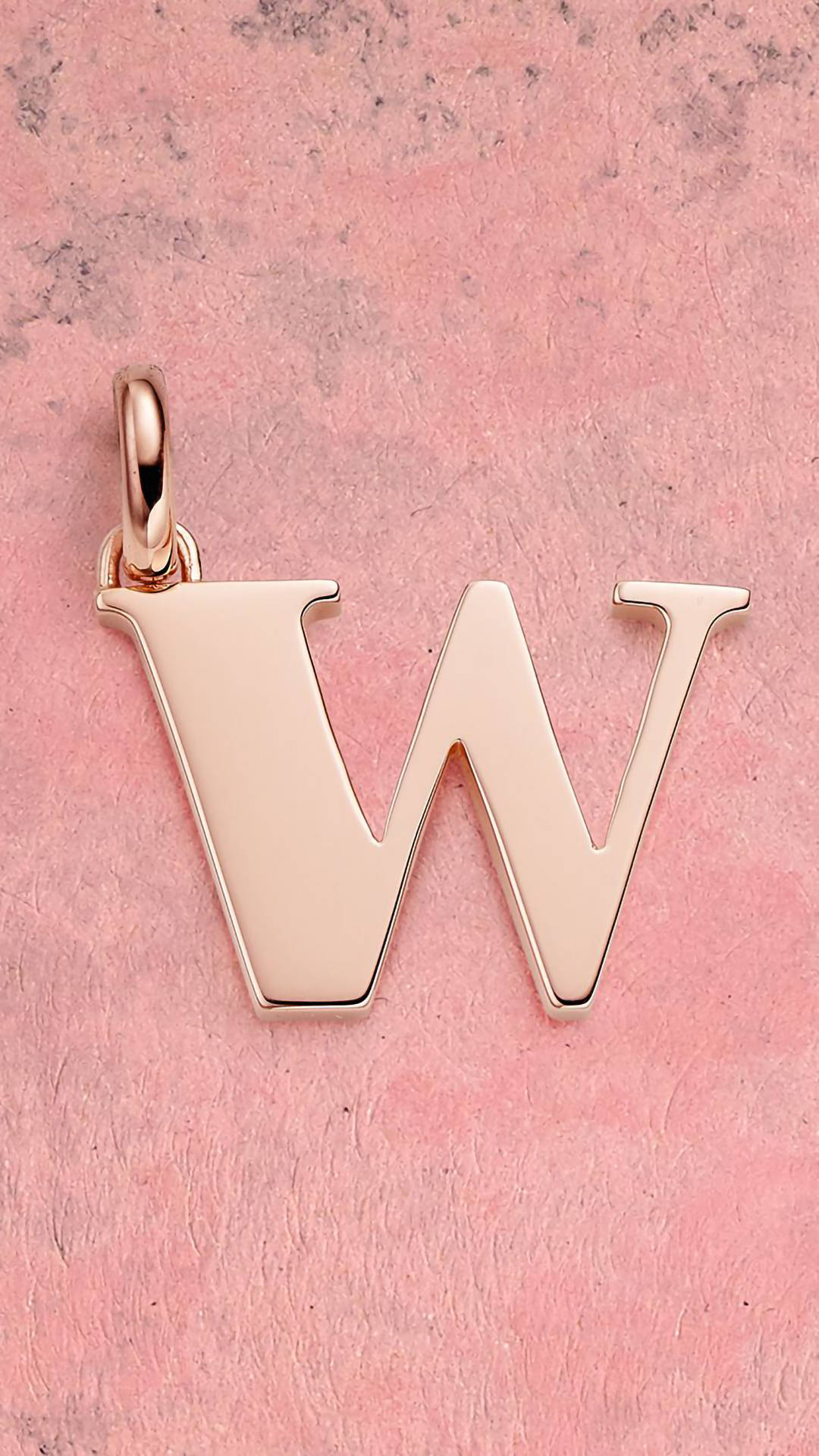 Elegant Pink Pendant in the shape of Letter W Wallpaper