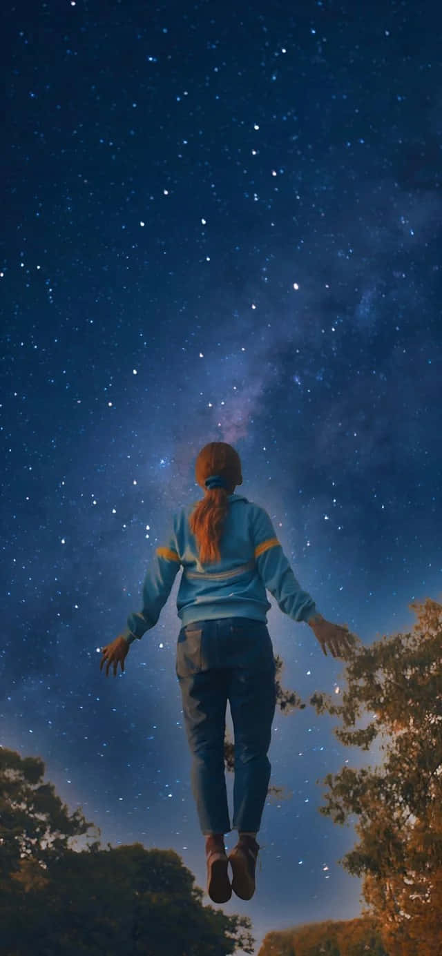 Levitating Girl Starry Night Sky Wallpaper