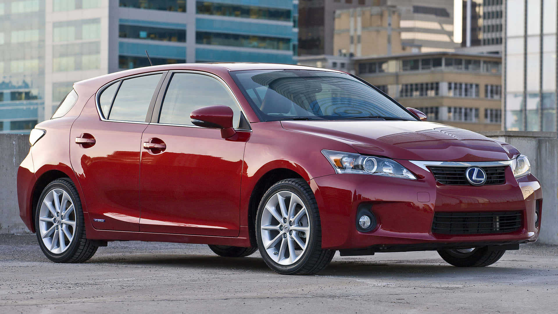 Sleek Lexus CT 200h Hybrid on a metropolitan background Wallpaper