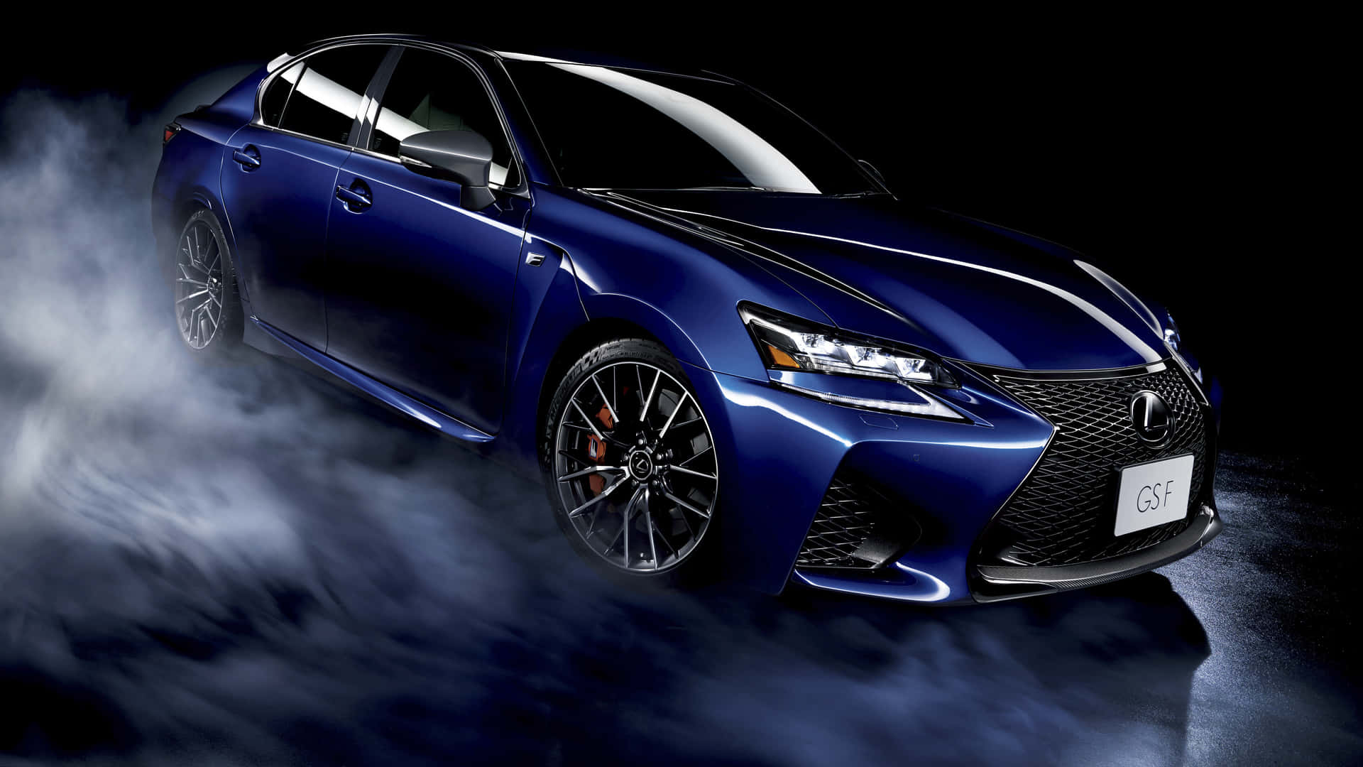 Captivating Lexus GS Showcased in a Vibrant Environment Wallpaper