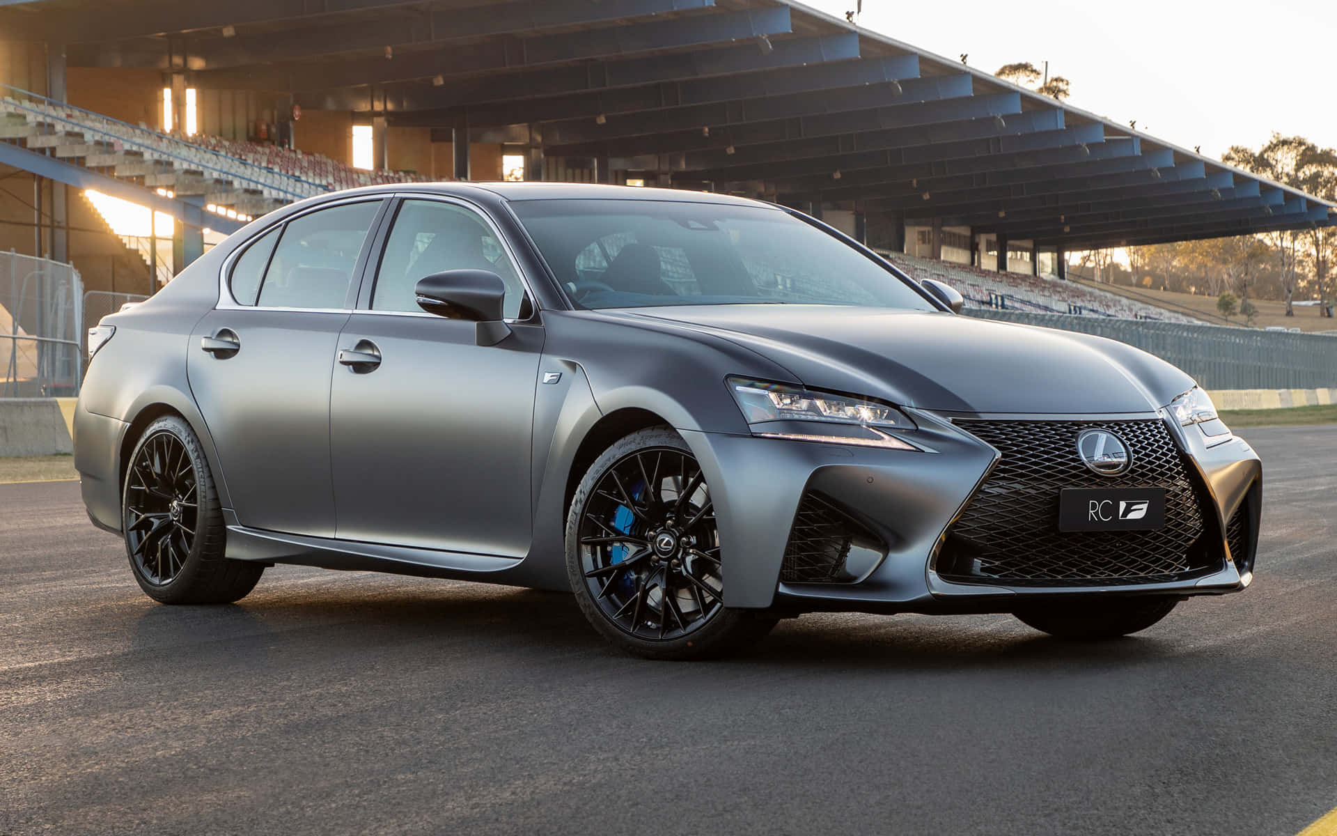 Sleek and Stunning Lexus GS F in a Beautiful Scenic Road Wallpaper