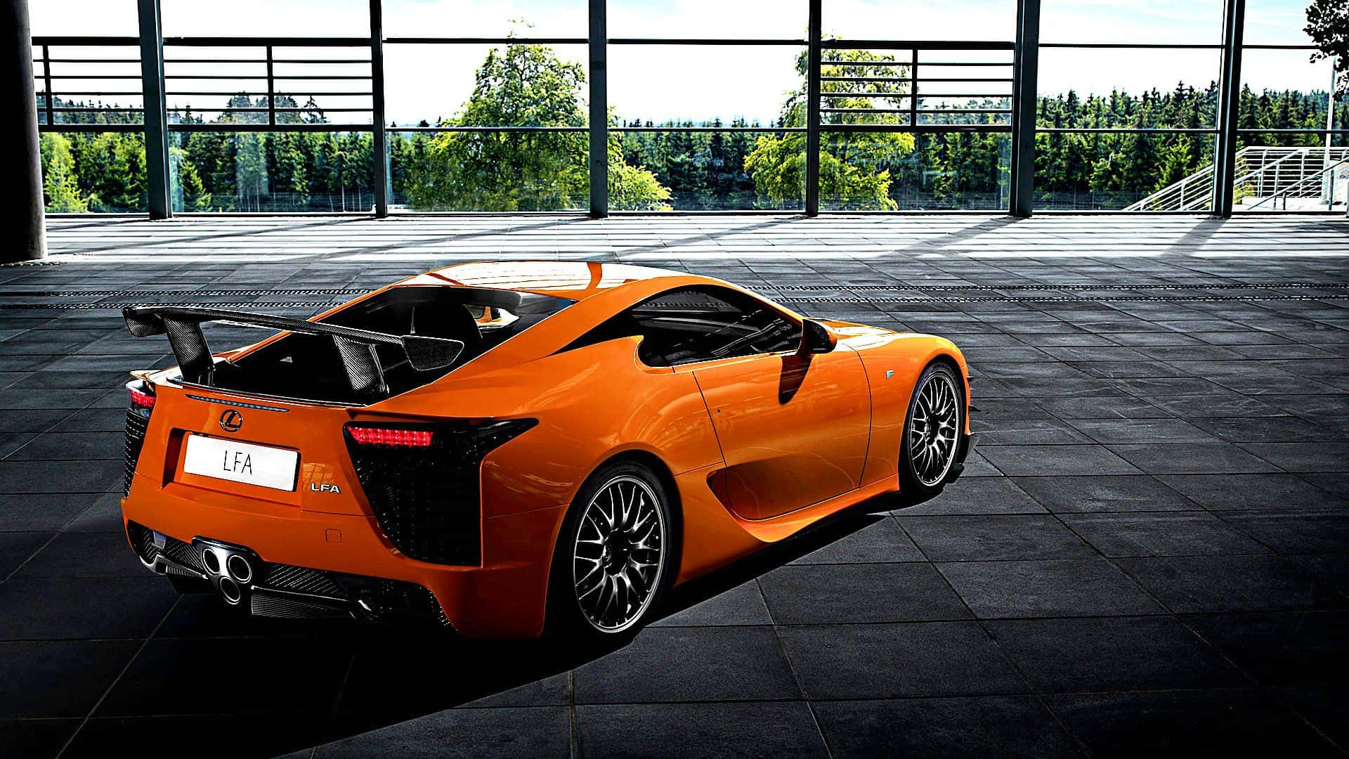 Caption: Stunning Lexus LFA Sports Car in Action Wallpaper